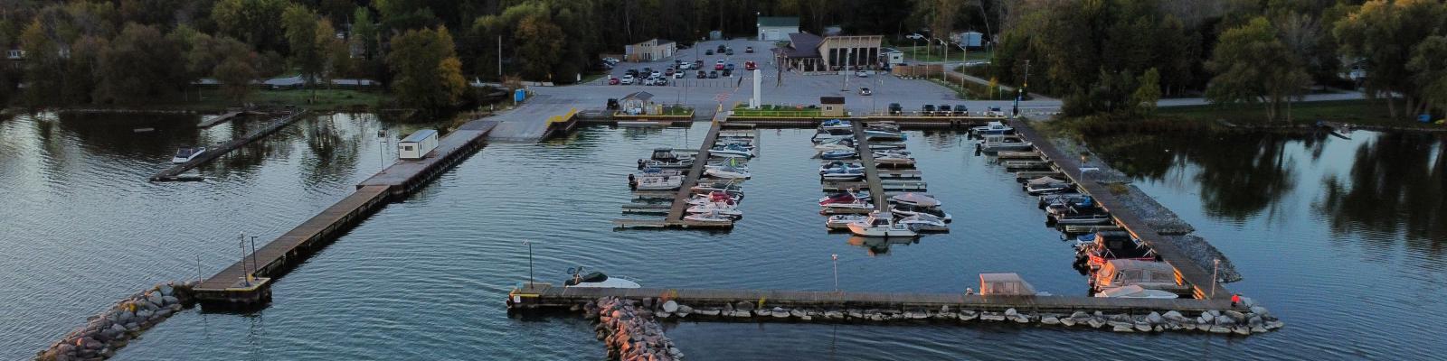 Aerial view of a marina with boats docked