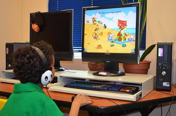 Child using computer at the Library